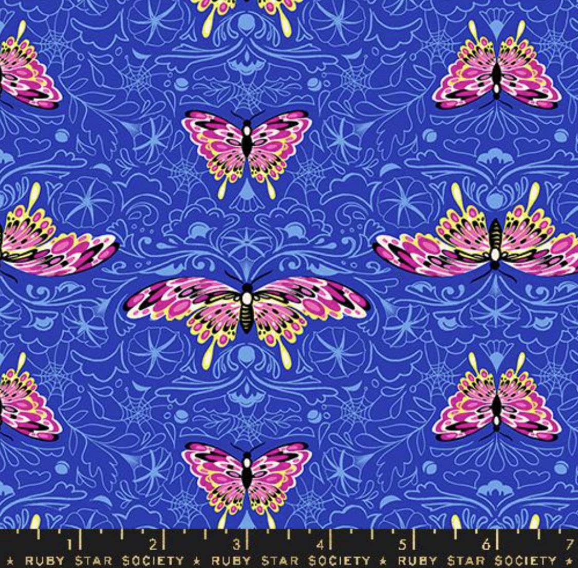 Glow Garden Morning Moth in Blacklight