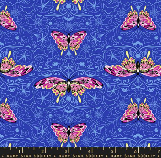 Glow Garden Morning Moth in Blacklight